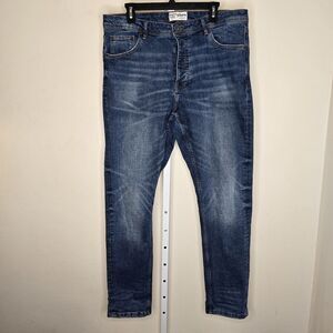The Stronghold Men's 36x34 (36x33) Relaxed Tapered Denim Jeans Button Fly